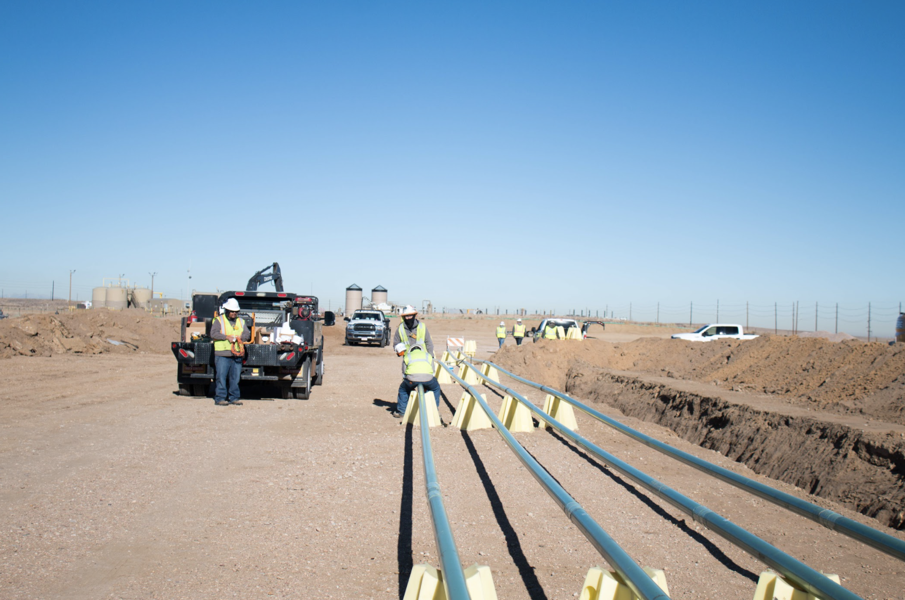 The Fortress Development Solutions Team working on a new flowline connection while digging, connecting to a meter house, and there was a hydrovac project happening right up the site as well. 