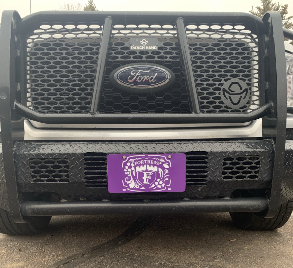 Fortress Development Solutions Construction Development Team New Branded License Plates. BRAX MetalWorks Designed These Custom Plates For Us.